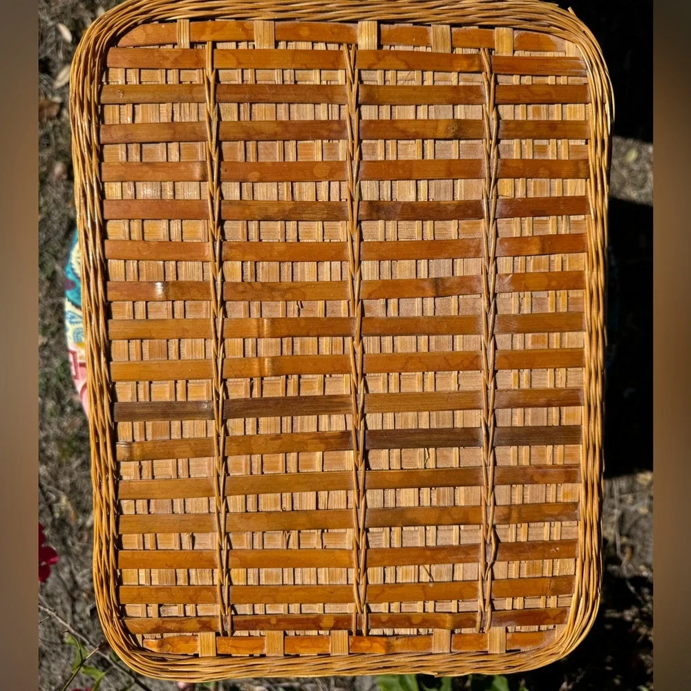 Large Vintage Handmade tan rattan picnic basket with handles.